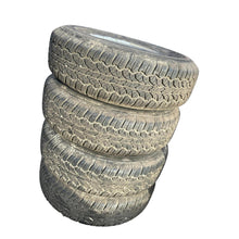 Last inn bildet i gallerivisningen, 15 Inch Rim and All-Terrain Tire Set – Classic UAZ – Used – Price per Set of 4 - - UAZ spare parts